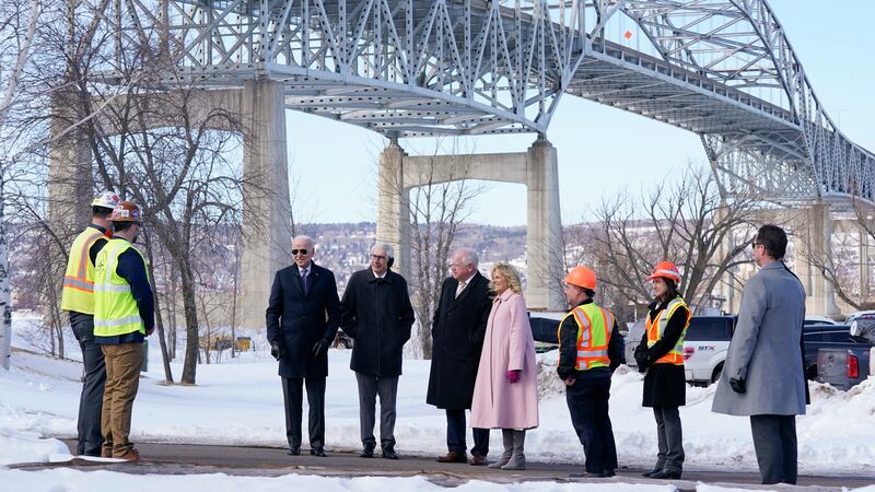 FILE - President Joe Biden and first lady Jill Biden visit the John A. Blatnik Memorial Bridge...