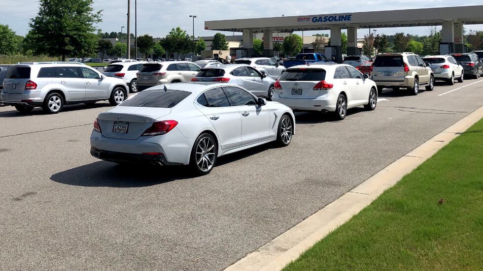 Cars line up to fuel up on May 11, 2021, at the Costco in Augusta.