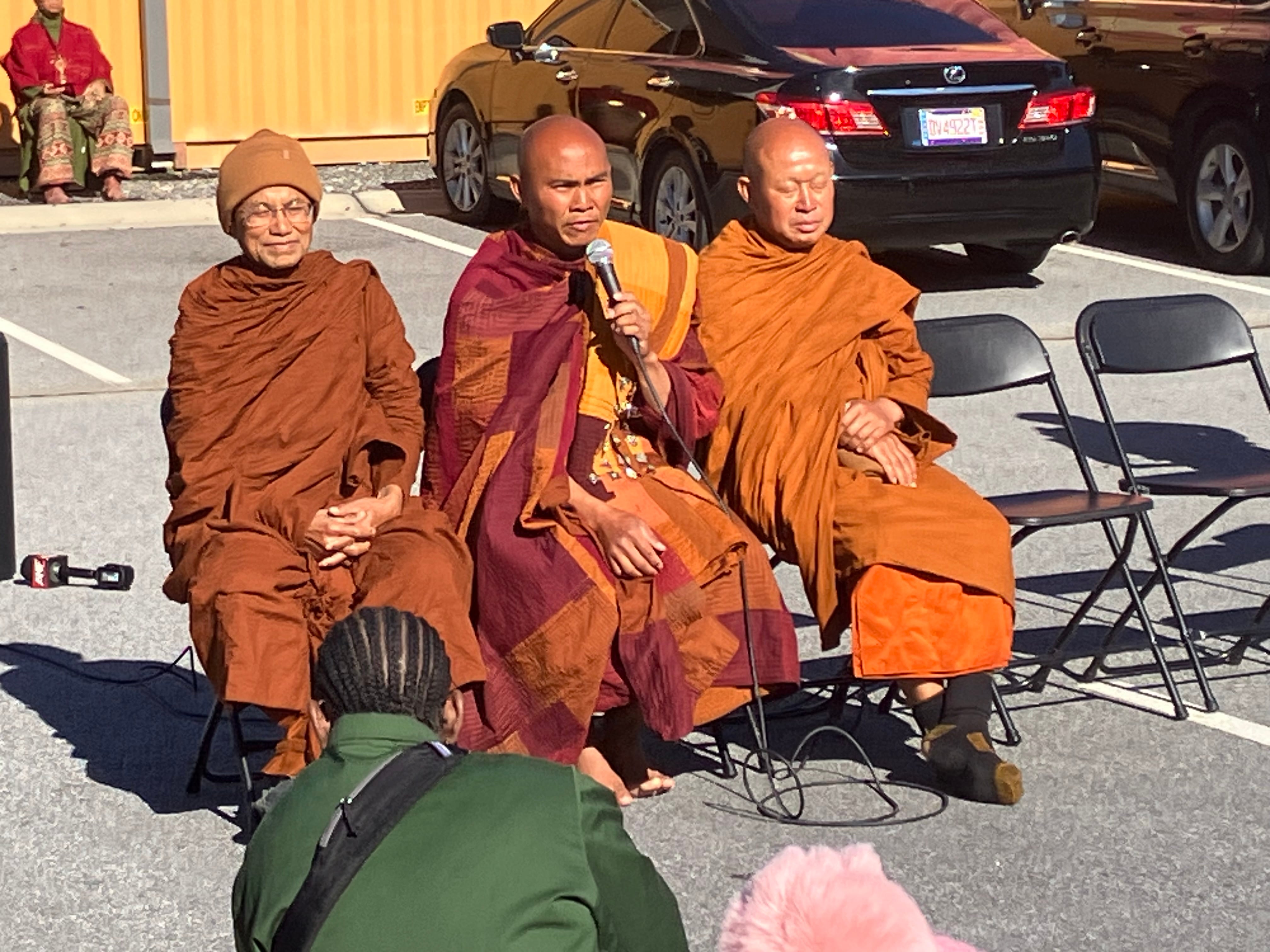 Monks Ran Over Buddhist monk hit by car during peace walk reunites with group in Ga.