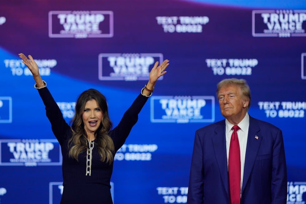 FILE - Republican presidential nominee former President Donald Trump and South Dakota Gov....