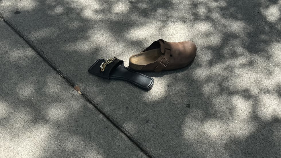 Shoes were still on the sidewalk in front of Sole, where they'd come off people's feet in the...
