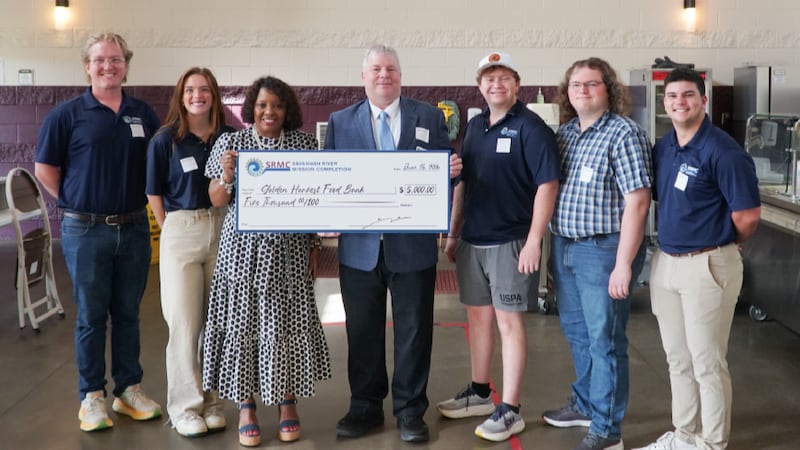 Savannah River Mission Completion employees rolled up their sleeves at Golden Harvest Food...