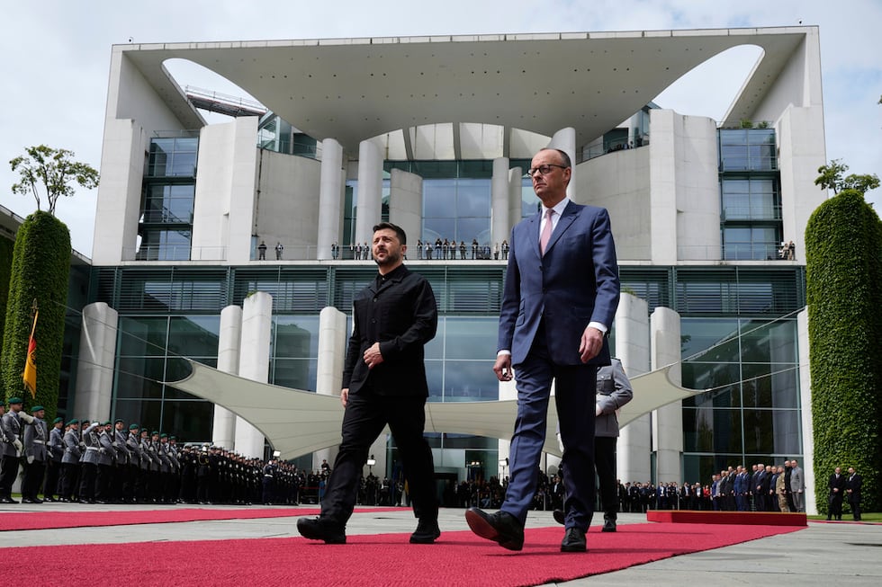's Chancellor Friedrich Merz, right, welcomes Ukraine's President Volodymyr Zelenskyy...