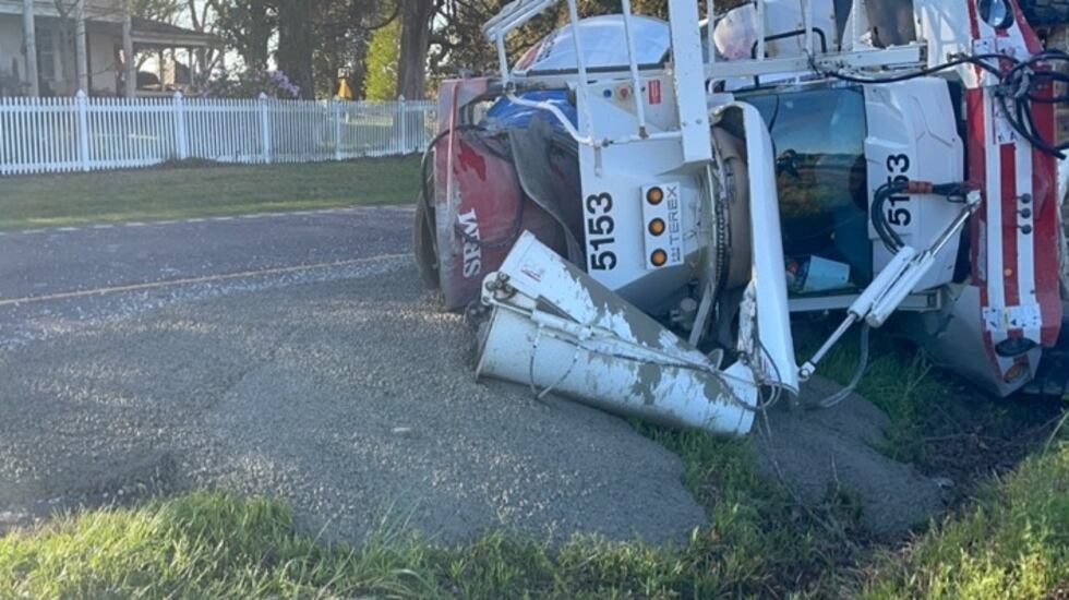 Overturned concrete truck on Highway 121