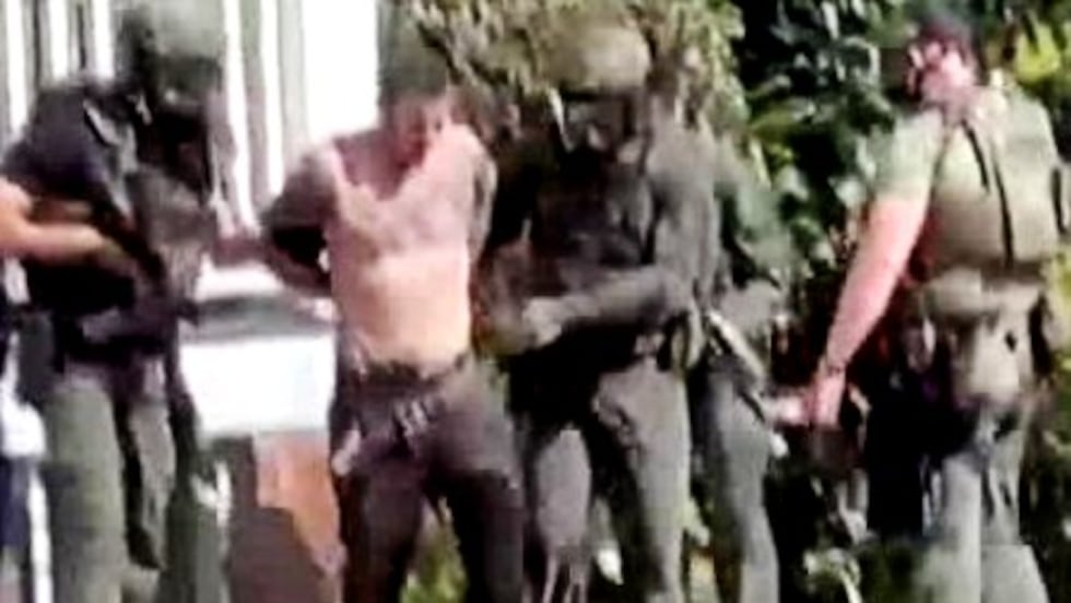 Suspect Richard Dahlheimer is taken into custody.
