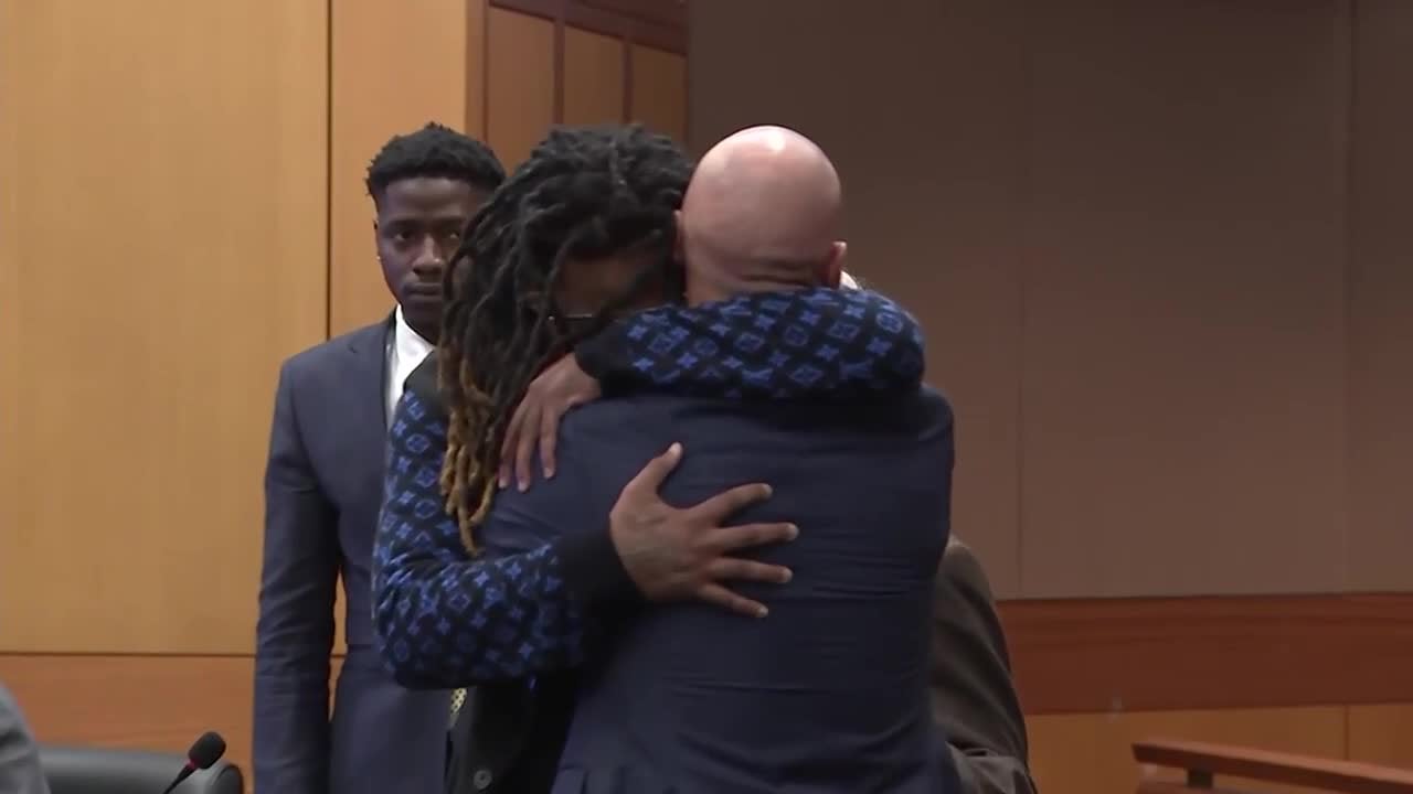 Shannon Stillwell hugs his attorney Max Schardt as verdicts are announced in the YSL trial.