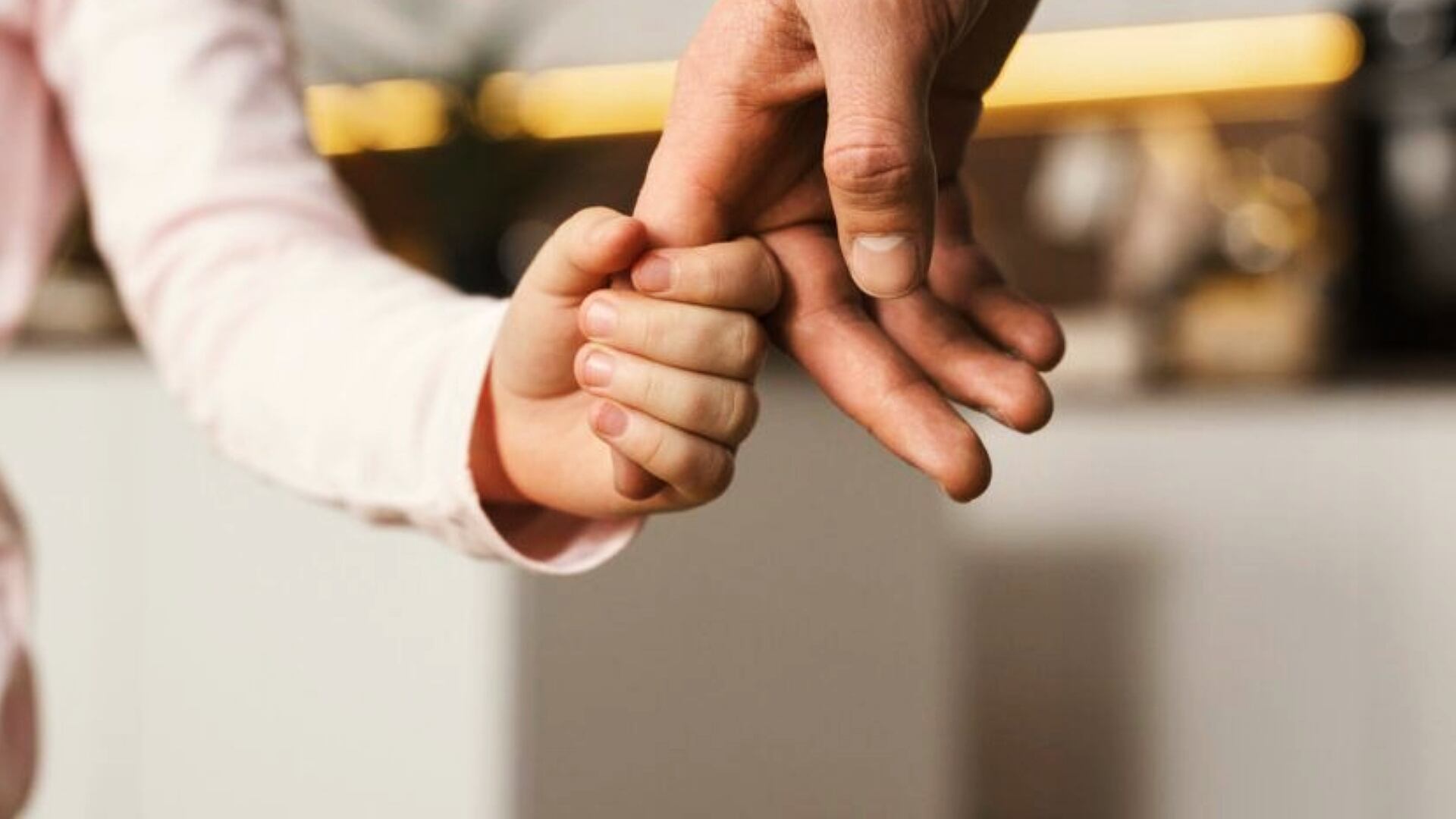 Holding child's hand