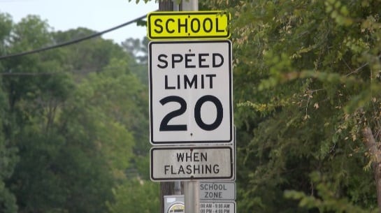 Flashing school zone lights and lower speed limits are back.