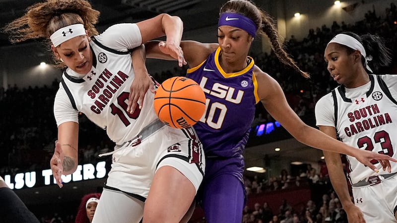 South Carolina center Kamilla Cardoso vies for the ball with LSU forward Angel Reese during...