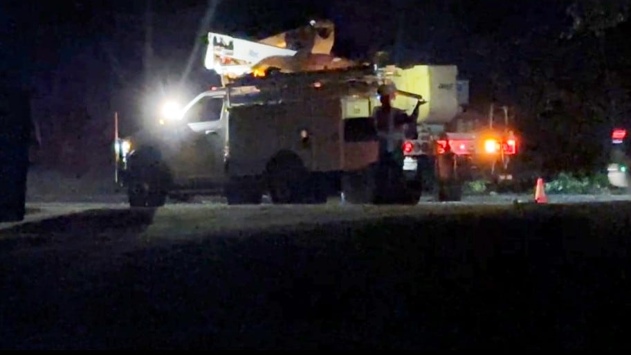 Crews deal with damage after a storm blew through on the night of June 7, 2025.