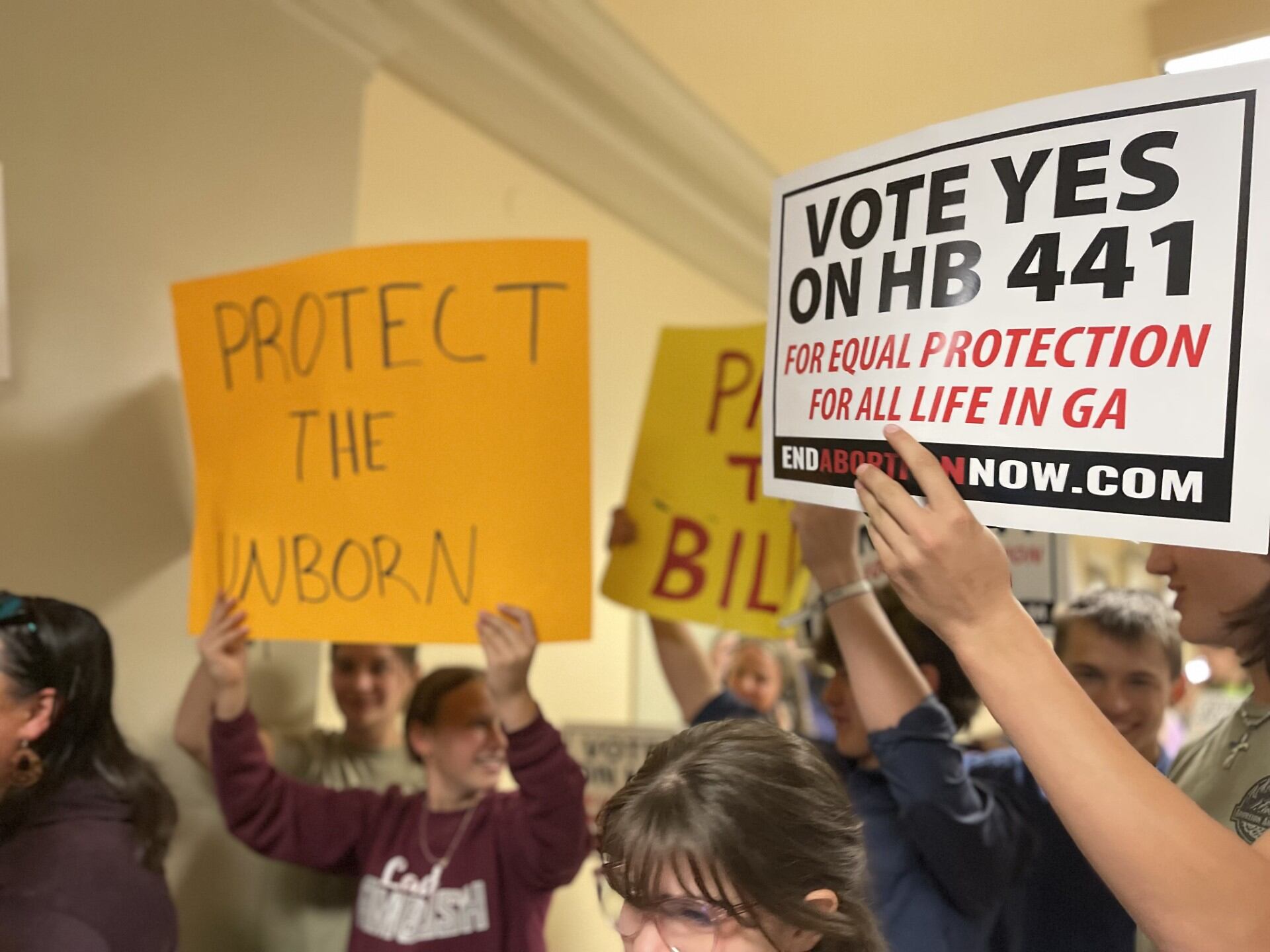 ers of Georgia HB441, which would make abortion a murder crime, wait outside a packed...
