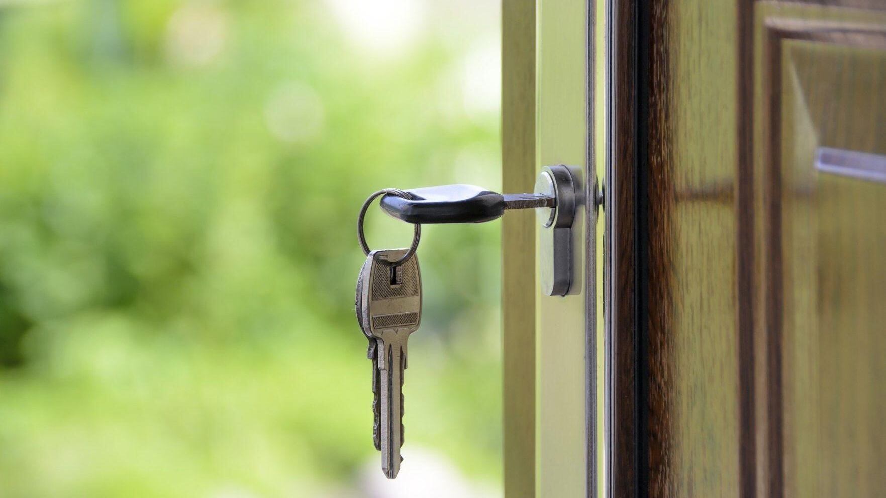 House with keys in front door