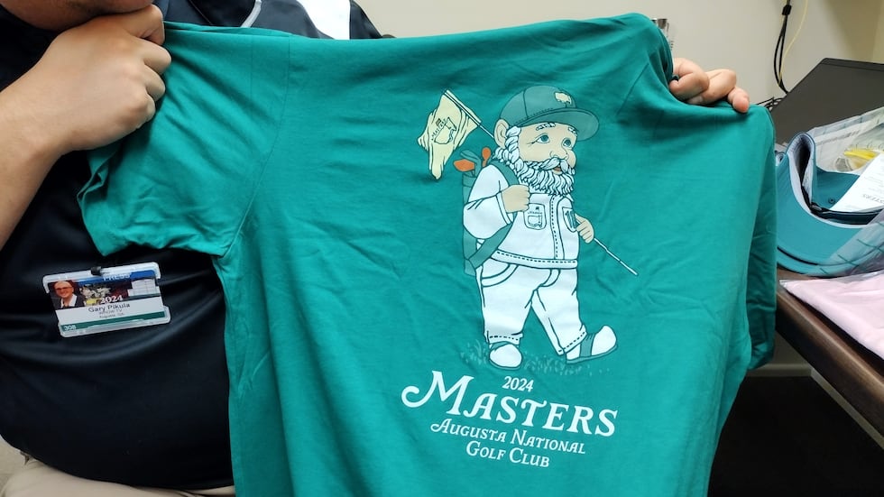 The caddie gnome lives on as a character on an Augusta National Golf Club T-shirt.