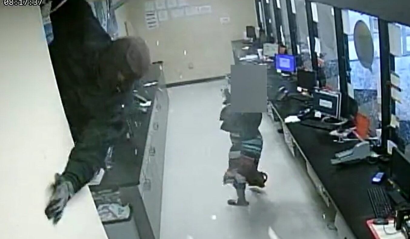 Check cashing business robbery suspects