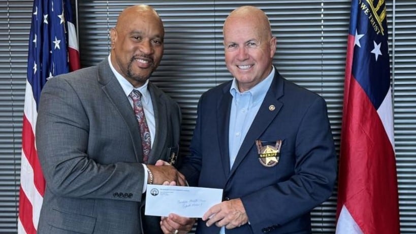 From left Richmond County Sheriff Eugene Brantley and Terry Norris.