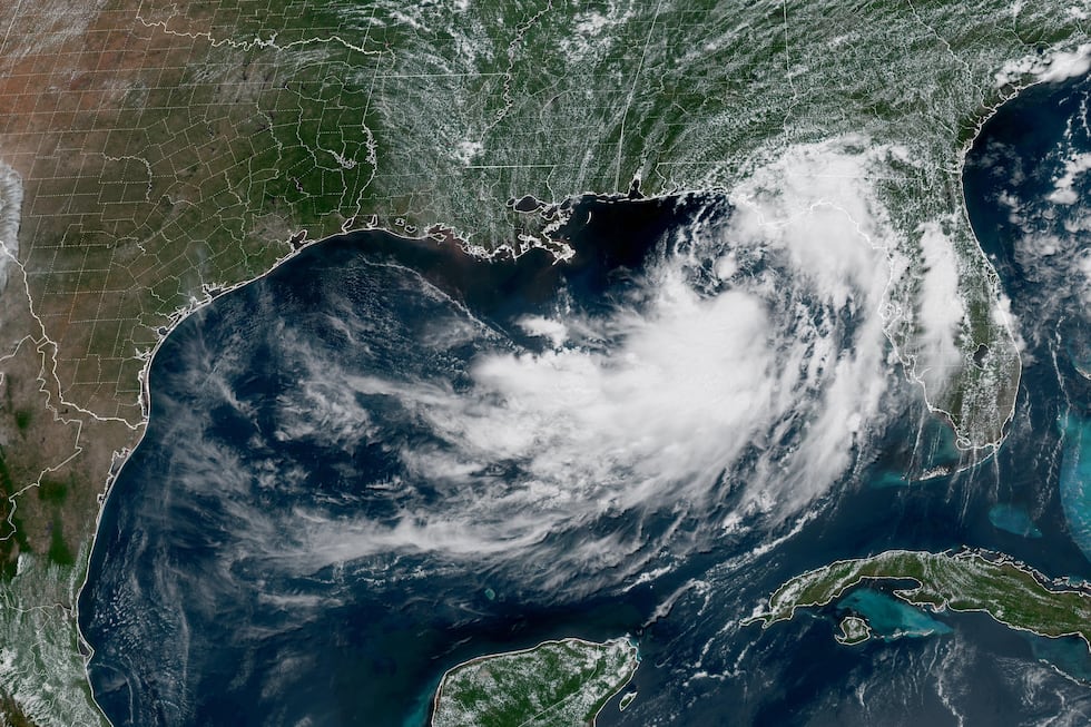 This GOES-19 GeoColor satellite image provided by NOAA shows a tropical depression in the Gulf...