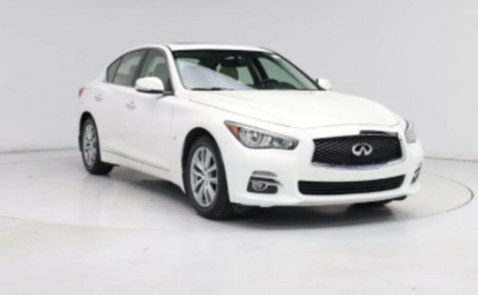 The driver of a white Infiniti Q-50 is suspected of fatally striking a pedestrian.