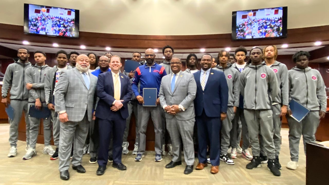 Augusta city leaders congratulate basketball champs from Westside High School.