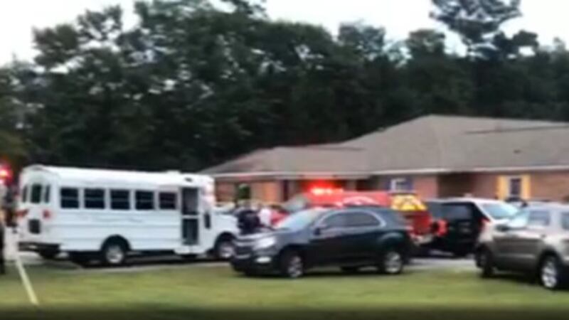 Authorities say two infant twin brothers found in a vehicle outside a daycare center Wednesday...