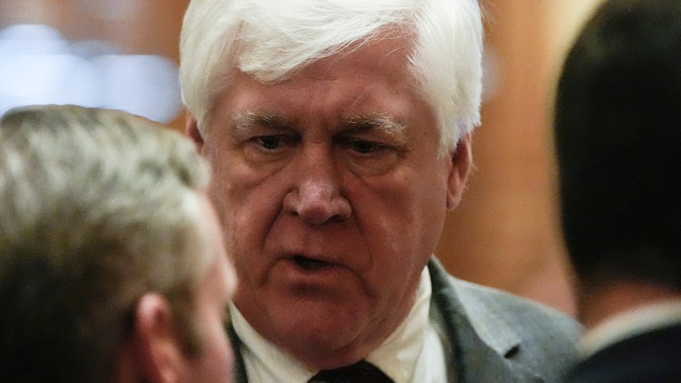 Sen. Bill Cowsert, R-Athens, speaks with colleagues on the Senate floor, Thursday, March 6,...