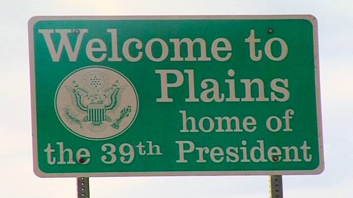 A sign welcomes visitors to Plains, home of Jimmy Carter.