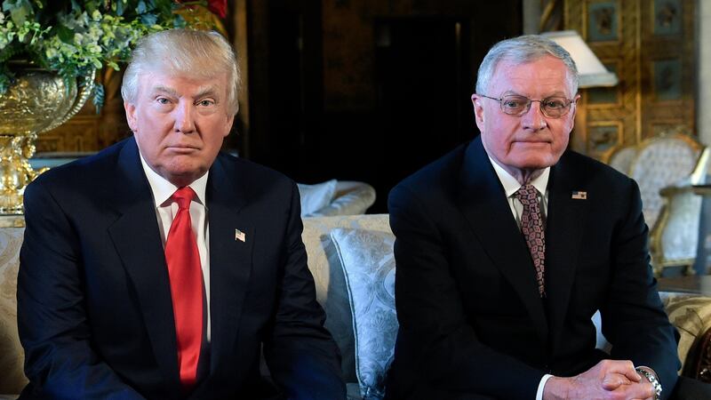 FILE - President Donald Trump, center, sits with retired Army Lt. Gen. Keith Kellogg, right,...