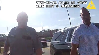 Sheriff Eugene Brantley, right, and a deputy are shown on another deputy's body camera after...