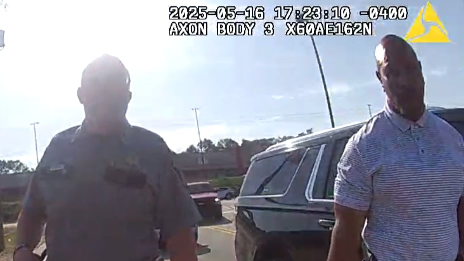 Sheriff Eugene Brantley, right, and a deputy are shown on another deputy's body camera after...