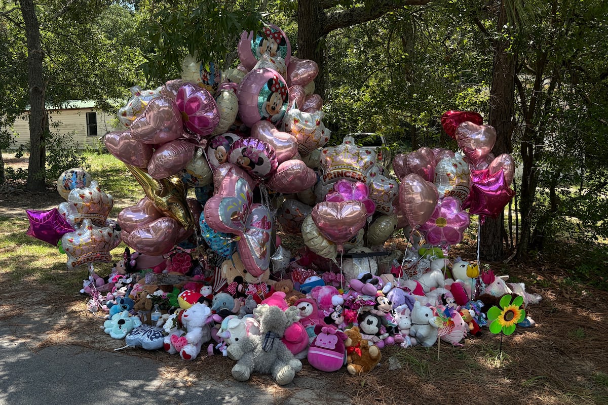 A memorial is growing outside Javeayah Harris’ home on Hillsboro Street as people look to...