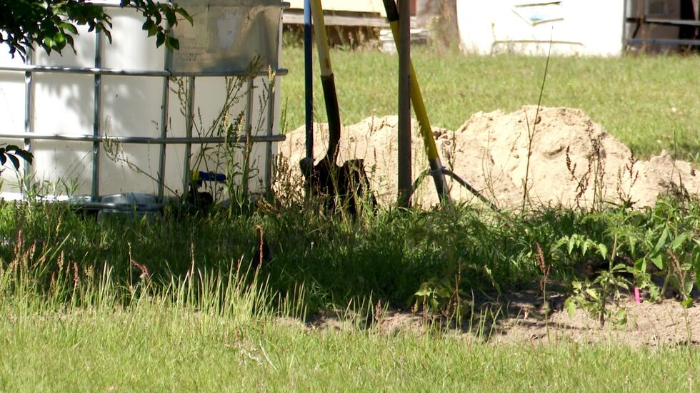 A shovel and dirt could be seen at the home where Joseph McKinnon buried Patricia Dent after...