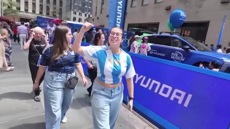 Argentina and Spain fans are swept up in World Cup excitement. (WCBS)